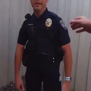 OFFICER STARTING TO GO UP ON THE ROOF BEFORE QUICKLY DUCKING BACK DOWN