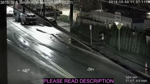 Creepy Halloween Clown with Shovel Jumps at Woman