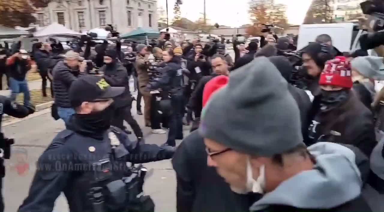 NOW - Police arrest two BLM supporters outside the courthouse of the Rittenhouse trail..