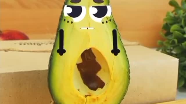 Funny avocado is trying to find its stomach