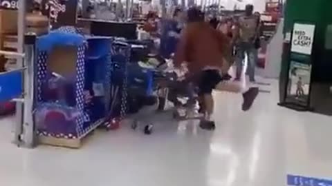 Guy f*cks around with the Walmart cart attendant & finds out.