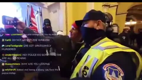 Protester and Capitol police giving high fives