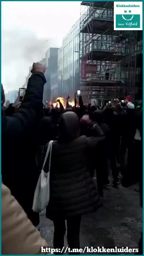 Belgium: Vaccine passport protesters chant, fire on the street. Nov. 20, 2021