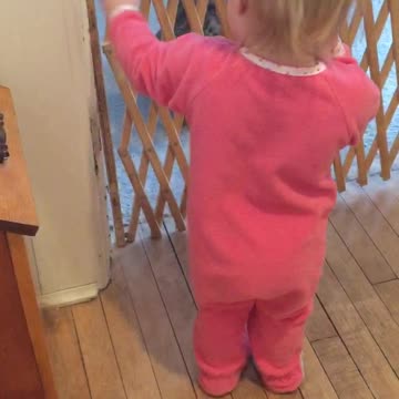 Little Girl Hugs And Kisses Potato Like It's Her Pet