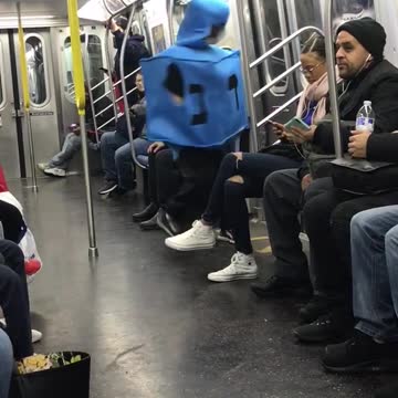Man blue square jewish writing costume spinning