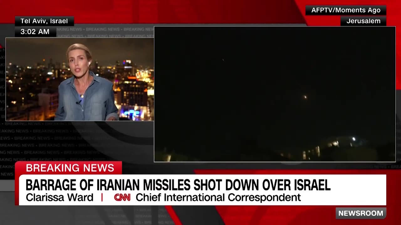 Explosions over skies of Israel as barrage of Iranian missiles and drones are intercepted