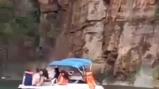 Minas Gerais Brazil - a heavy downpour caused a rock to collapse, crushing three boats.
