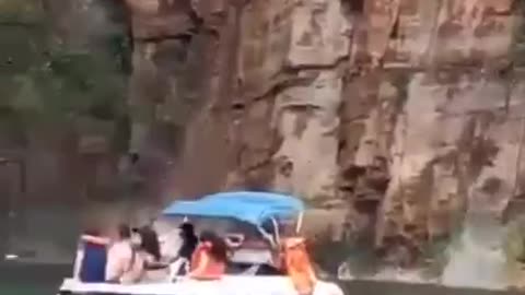 Minas Gerais Brazil - a heavy downpour caused a rock to collapse, crushing three boats.