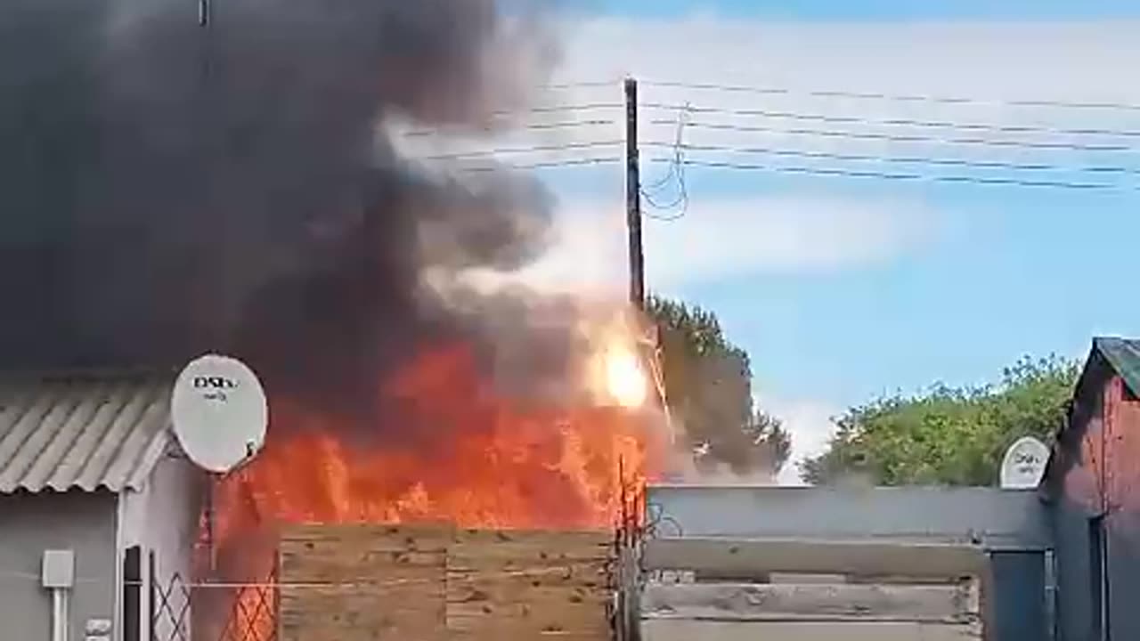 House alight, Heideveld, Cape Town, this morning