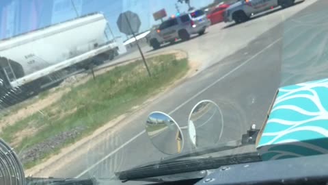 Police Car Clobbered by Passing Train