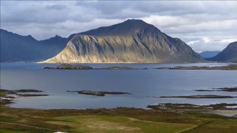 mountain and lake landscape around fredvang in norway