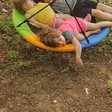 Babies loving their new swing