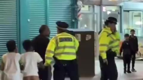 British police run away from children blowing kazoos at them…