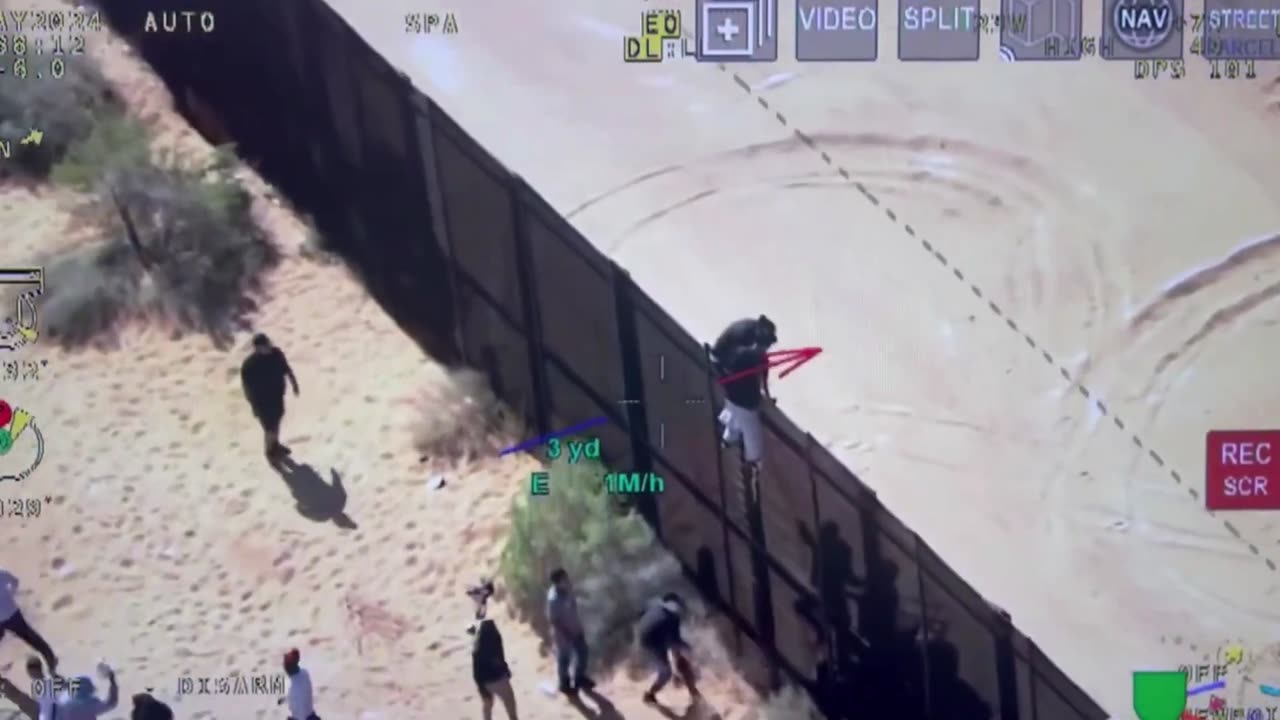 Migrants pelt Border Patrol agents with sand, water bottles while trying to climb wall into Texas