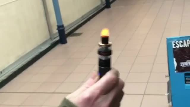 Beanie guy's black vape in subway catches on fire