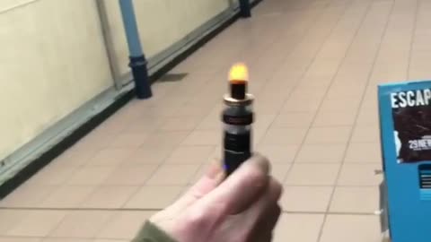 Beanie guy's black vape in subway catches on fire