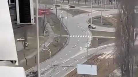 Russian tank runs over a driving civilian car in Ukraine