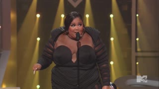 Lizzo claims she's "oppressed" while accepting music award