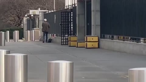 United Nations HQ in New York surrounded by police responding to a man armed with a shotgun.