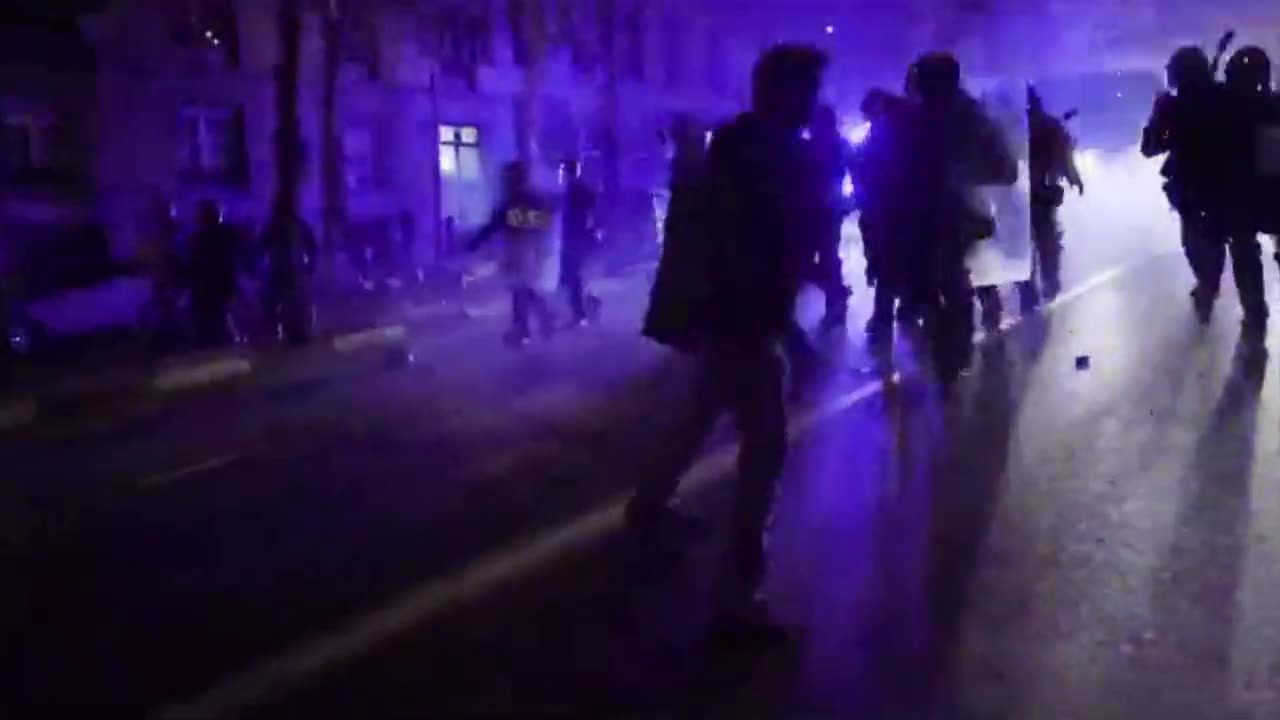 Police clash with protesters in Madrid Spain 👀