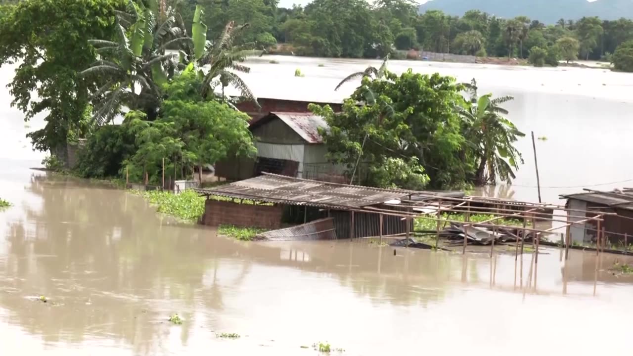 Floods inundate villages, city streets in northeast India