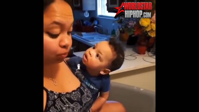 This Baby’s Shocked Facial Expression Over Not Getting a “Bite” of Mom’s Food - Priceless