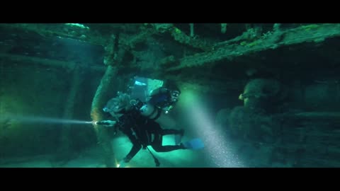 diving crew just Explores under the water