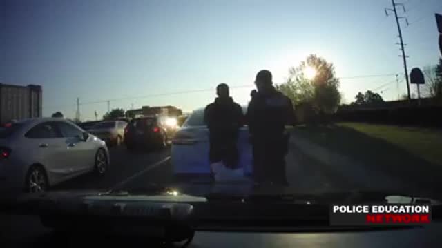 Dashcam - Officer Dragged From Traffic Stop Followed By A Dirt Road Chase