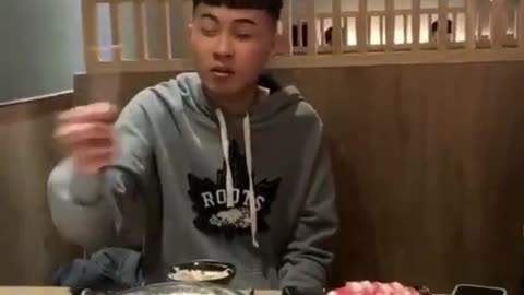 Boy showing talent in restaurant