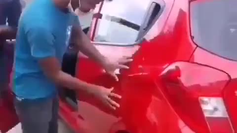 Trying To Open A Car Door