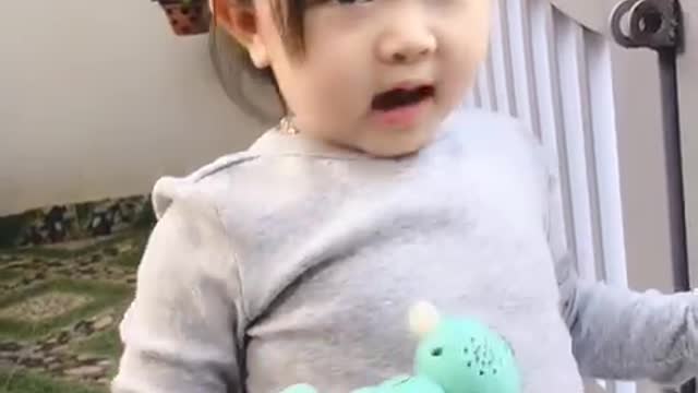 Cute expressive baby at home