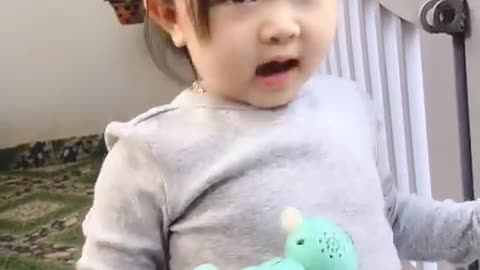 Cute expressive baby at home