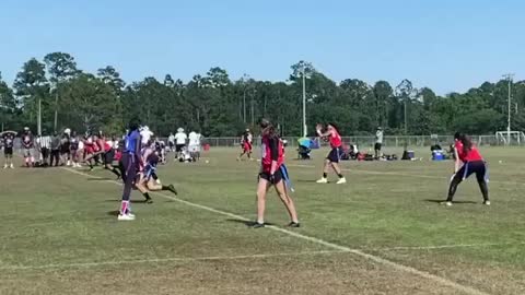 Girl Dodges Defenders and and Scores Touchdown During Football Game