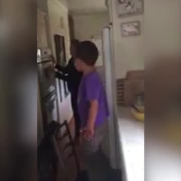 Funny Tot Boy Falls Off A Chair