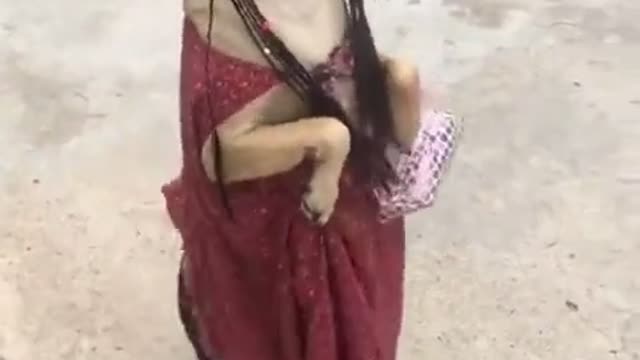 Very cute dog in girls dress