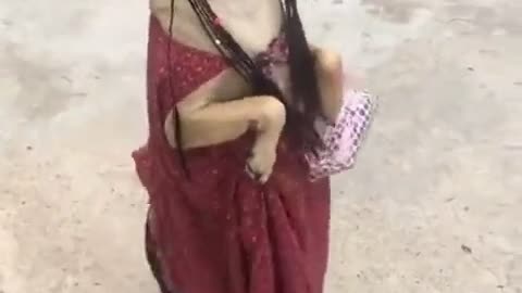 Very cute dog in girls dress