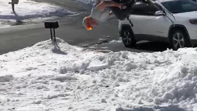 Skier Back Flips in the Front Yard