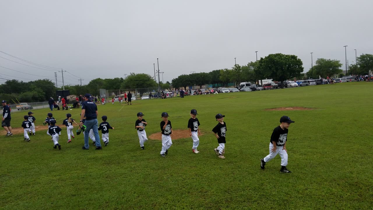 Nash-tball high 5s-end of game-2019-05-11 Colby on opposing team