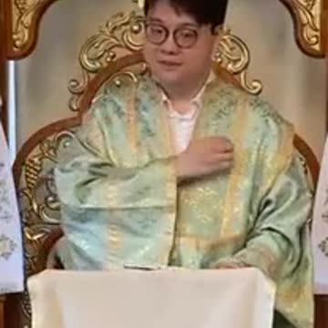 Ereticul Ecumenist Kenan Wang Hulitor,Schismatic,Apostat,Antihrist,Batjocoritor al Semnului Sv.Cruci