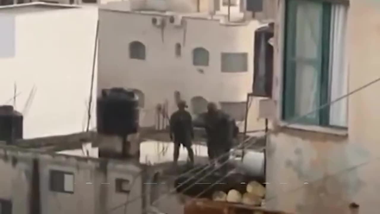 Israeli soldiers were caught on video kicking the body of a dead Palestinian man