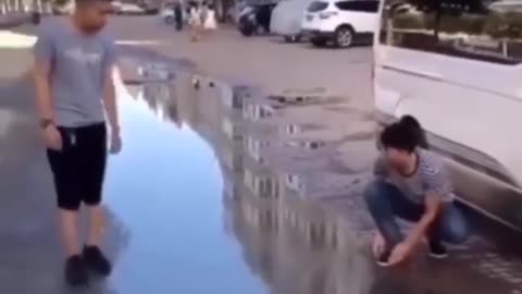 Walking through puddles and making his friend laugh down the chair