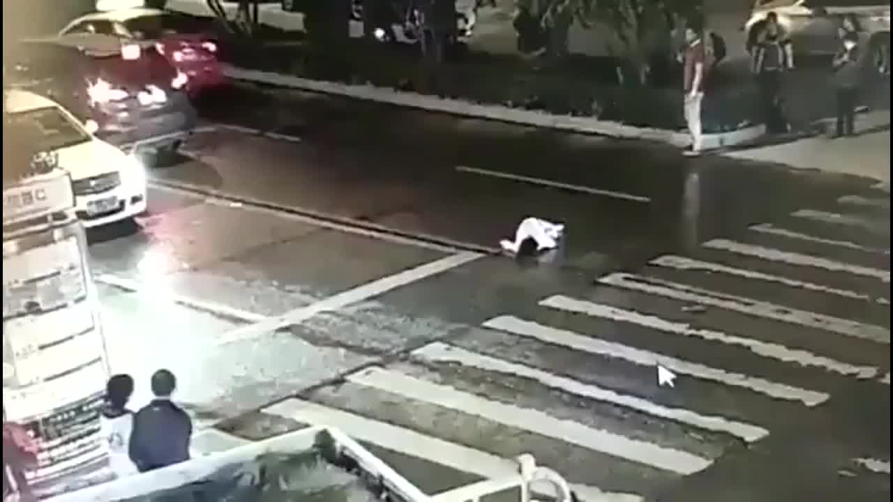 Chinese woman gets run over twice in the middle of a city & no one cares.