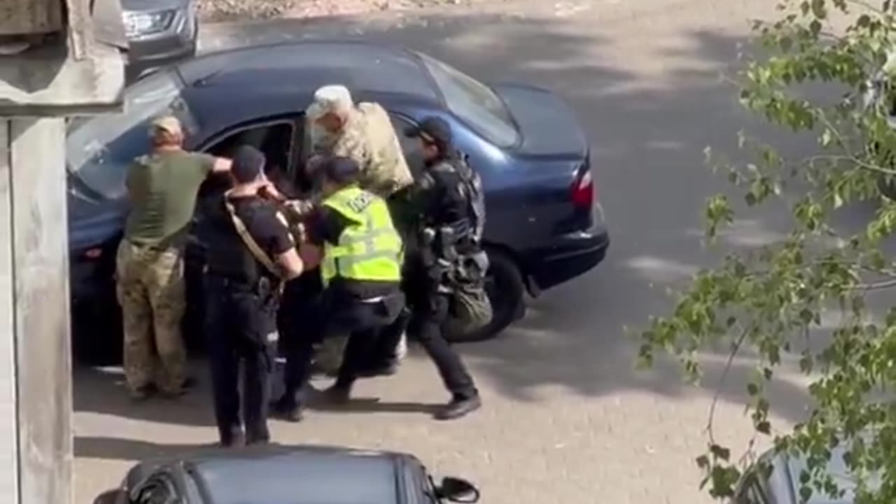 In Ukraine this is how regular men are forced to sign in the war and die.