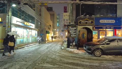 Beautiful street in snowy night.#10