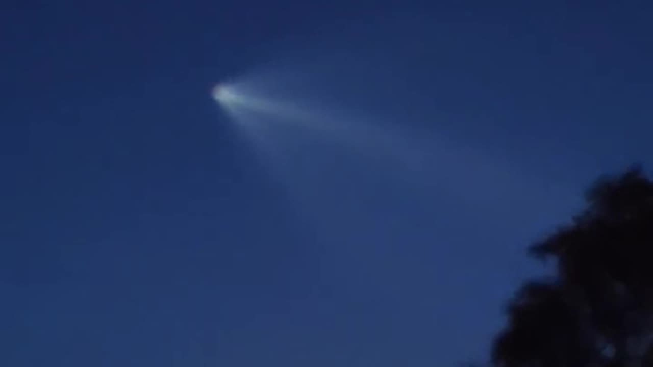 SpaceX rocket in the night sky