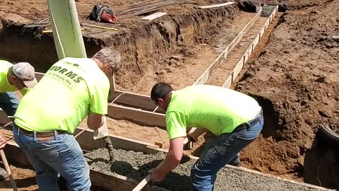 May 10, 2022 Pouring concrete footings on house