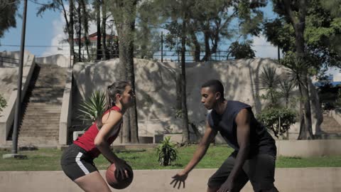 Basketball players practicing