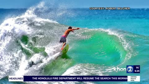 Surfer catches an artsy wave