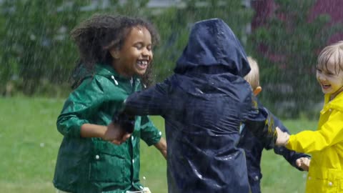 Kids having fun in rainy season