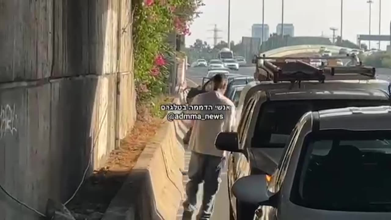 Israeli civilians take cover during attacks in Tel Aviv